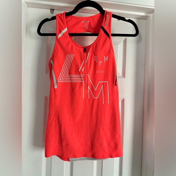 Reebok Tops - Les Mills x Reebok RPM cycle jersey size S.